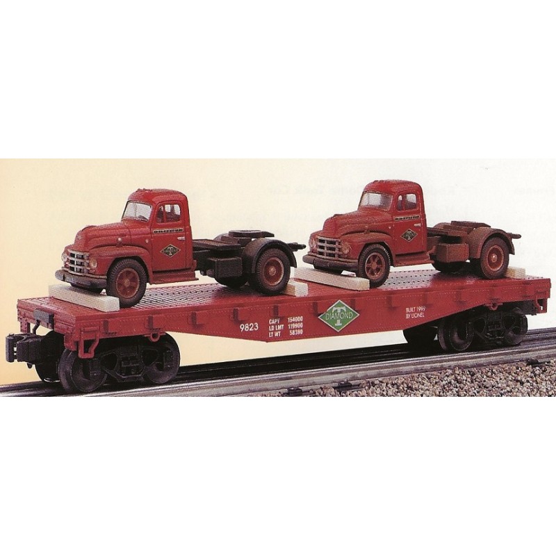 LIONEL 17534 DIAMOND T FLATCAR WITH 2 CORGI MACK B TRUCKS