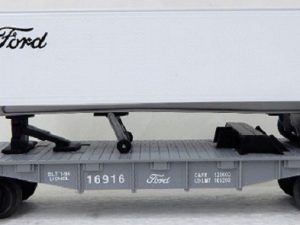LIONEL 16916 FORD FLATCAR WITH FORD TRAILER