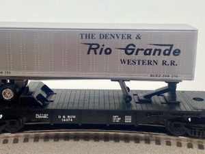 LIONEL 16374 DENVER AND RIO GRANDE WESTERN FLATCAR WITH TRAILER