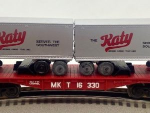 LIONEL 16330 MISSOURI KANSAS TEXAS FLATCAR WITH TRAILER